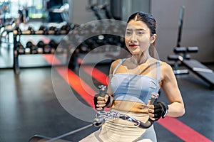 Front view of Asian women doing exercises in fitness, exercises to strengthen muscles and strength, lose body fat burning,