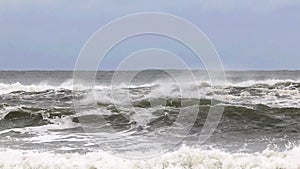 Front view of Atlantic Ocean with rough waters due to a storm off the coast of Long Island