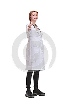 Front view of attractive happy smiling female doctor physician nurse standing with arms crossed