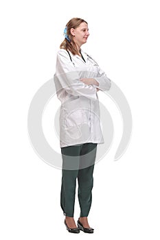 Front view of attractive happy smiling female doctor physician nurse standing with arms crossed