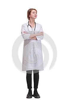 Front view of attractive happy smiling female doctor physician nurse standing with arms crossed