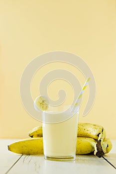 front view banana milkshake with fruits