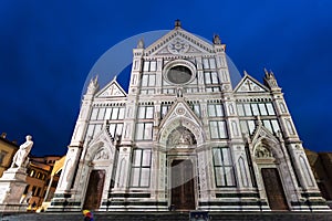 Front view of Basilica Santa Croce in rainy night