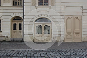 Front view of beautiful old stone building at urban street