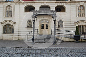 Front view of beautiful old stone building at urban street