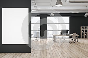 Front view on blank white poster on dark wall in eco style coworking office with city view from big windows, black walls and