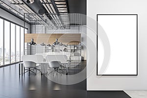 Front view on blank white poster with empty space on light grey wall in loft style coworking office with dark floor, lattice