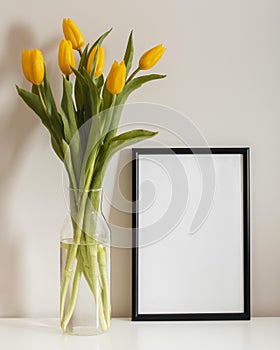 front view bouquet tulips vase with empty frame. High quality photo
