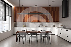 Front view on bright kitchen room interior with dining table