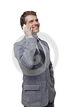 Front view of business man in suit  talking on mobile phone