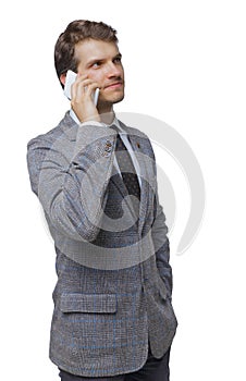 Front view of business man in suit  talking on mobile phone