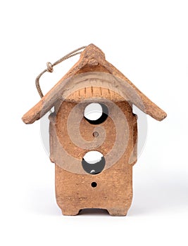 Front view of clay birdhouse