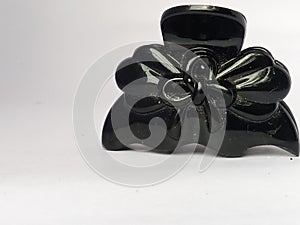 The front view of the Decorated party hair clip placed isolated in a white background.