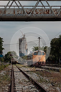 Front view of The diesel electric locomotive is parked on Old railroad tracks