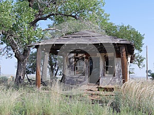 Dilapidated remains of a building at Glenrio ghost town, an old mining town in New Mexico photo