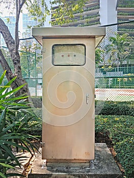 Front view, Electrical metal cabinet in park