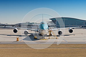 Front view of a famous four engines big jet plane