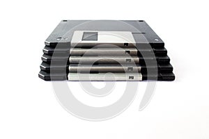 Front view of Floppy discs stacked on white background