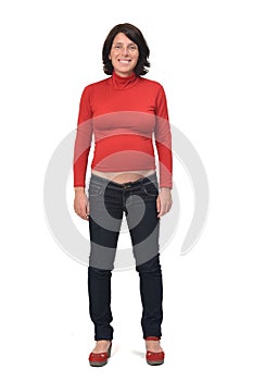 Front view of full portrait of a pregnant woman with casual clothes on white background