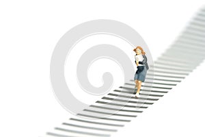 Front view of a girl pupil student running on zebra crossing crosswalk.