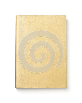 Front view of golden blank book cover