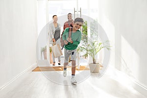 Family entering their house photo