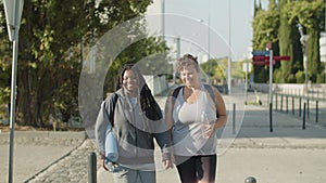 Front view of happy fat women going to gym in sportswear