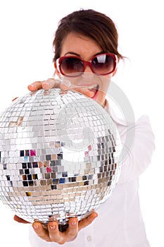 Front view of happy woman holding disco ball