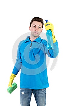 Front view of a houseowner in gloves with sponge and detergent.