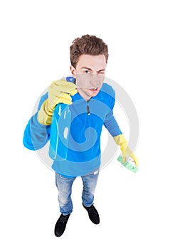Front view of a houseowner in gloves with sponge and detergent.