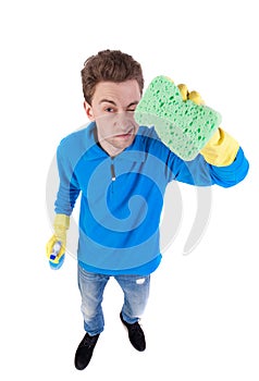 Front view of a houseowner in gloves with sponge and detergent.
