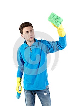 Front view of a houseowner in gloves with sponge and detergent.