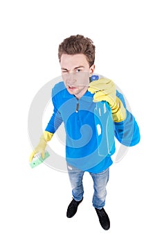 Front view of a houseowner in gloves with sponge and detergent.