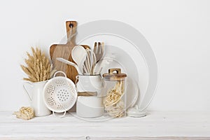 Front view of kitchen table with baking tools and decor