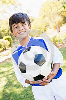 front view of little boy balloon holding balloon