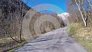 Front view of little road through Norway forest in Trolltunga