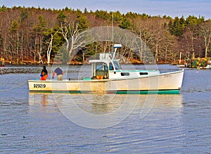 Maine lobstermen collecting lobster pots