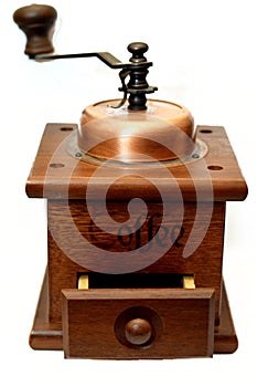 A front view of a manual coffee grinder burr mill machine with catch drawer, conical burr mill and spice hand grinding