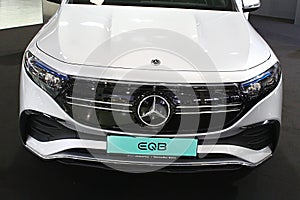 Front view of Mercedes Benz EQB, seven seat compact electric battery powered crossover SUV car, white colour