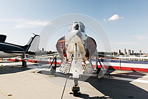 A front view of a military jet fighter plane