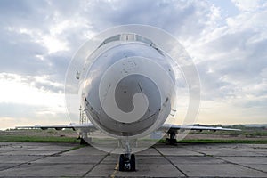 Front view of a modern large civil plane landed on the runway at the airdrome