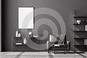 Front view of modern living room interior with one empty poster on dark grey wall, mock up. Furnished by black armchair, coffee