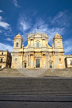 front view of Noto Cathedral (Minor Basilica of St Nicholas of Myra) in Sicily. Vertical view