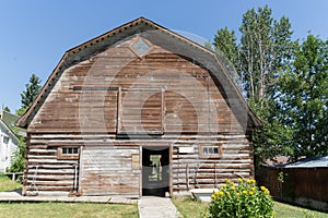 Front view of an old brown barn
