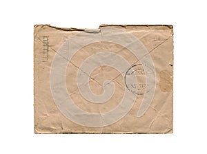 Front view of old closed aged paper envelope isolated on white