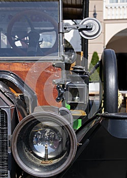 Front view of an old Ford Car.