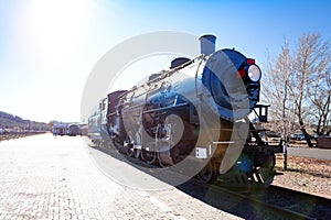 Front view of old steam iron big USA locomotive