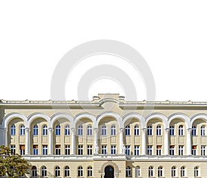Front view on the old yellow office building isolated on white