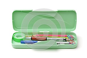 Open plastic pencil box with different supplies
