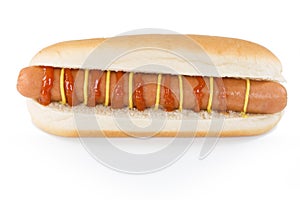 Front view from a opened hotdog with sausage, ketchup and mustard isolated on white.